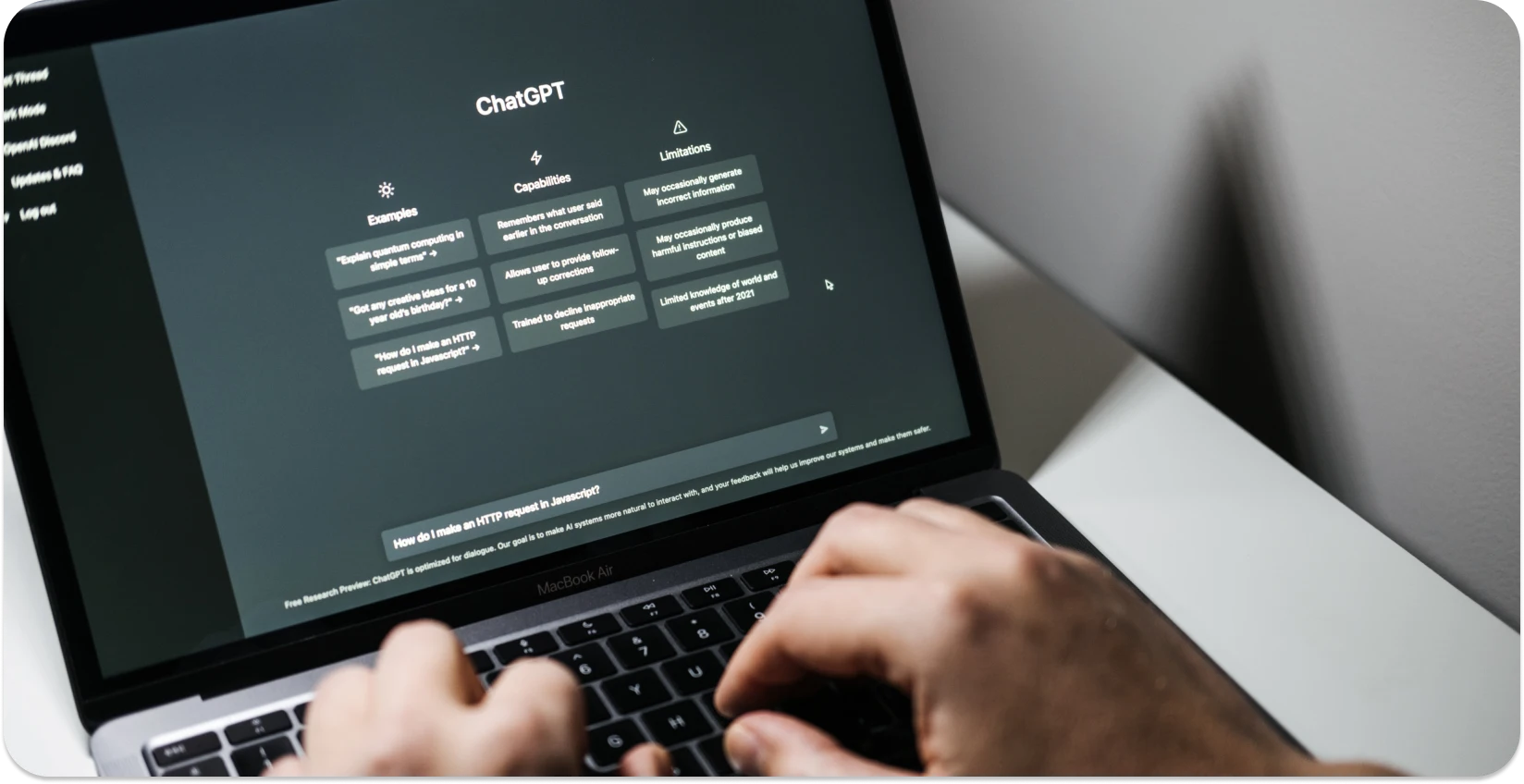 Person using ChatGPT on a laptop, showcasing the tool's interface and capabilities for transcription