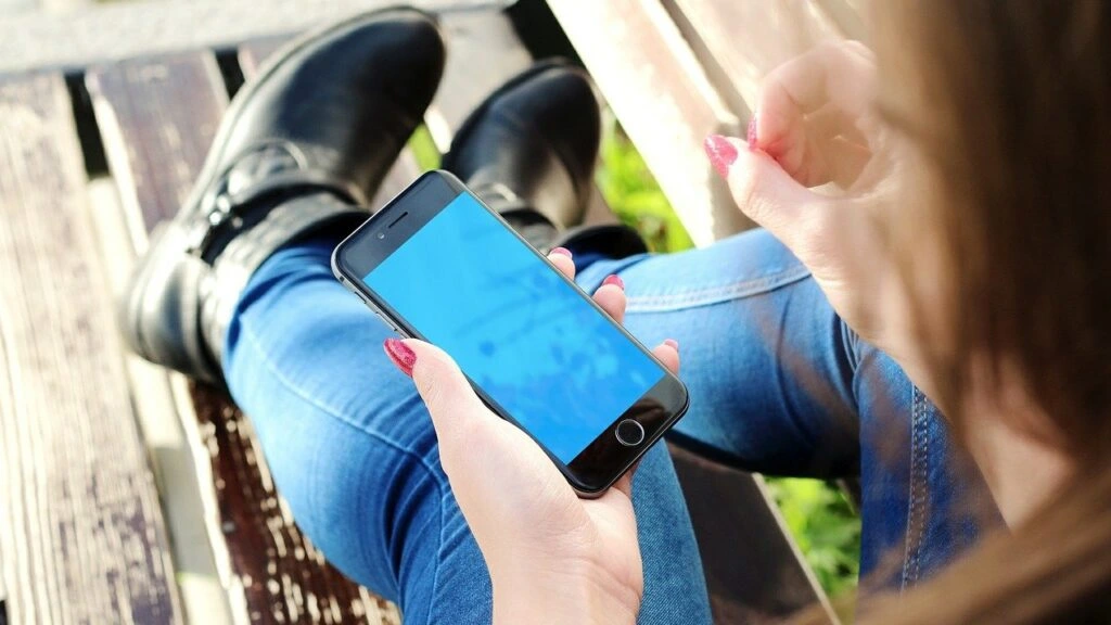 Woman converts mp4 to text with her phone