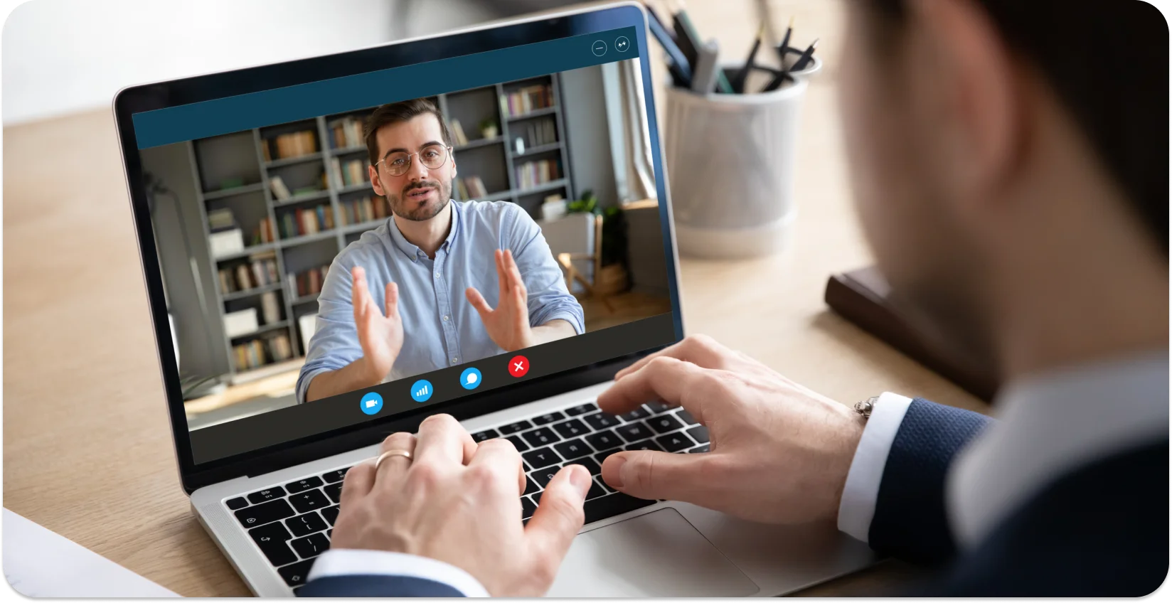 Man explaining phonetic transcription during an online call.